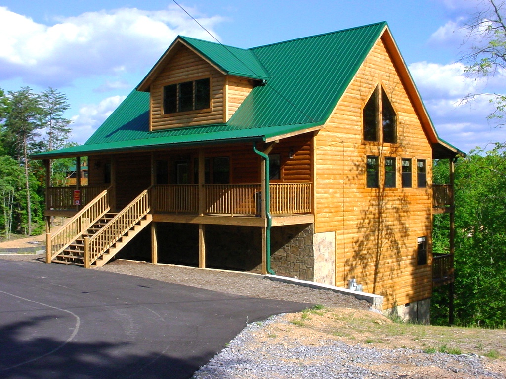 Log cabin in a wooded area. 